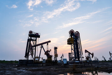 Wall Mural - In the evening of oilfield derrick