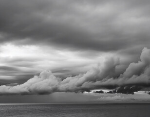 Wall Mural - Beautiful cloudy sky in a black and white photograph on a rainy day
