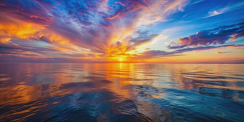 Wall Mural - a serene ocean scene with a colorful sunset reflecting on the water, sunset, ocean, sea, water, hori