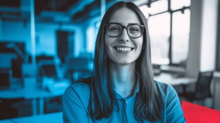 Wall Mural - An online course on marketing with the main colors being blue and red. A woman in business casual is smiling in the office