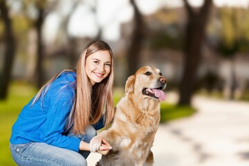 Poster - A young beautiful girl with dog for a walk.