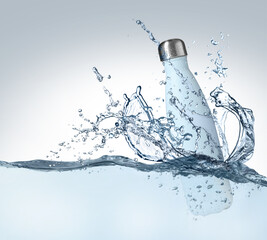 Sticker - Bottle of water and splashes on light background