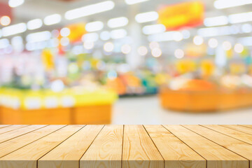 Sticker - Empty wood table top with supermarket blurred background for product display