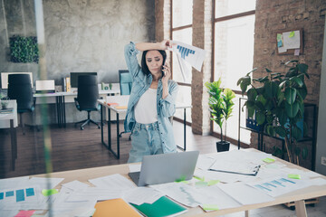 Poster - Photo of attractive young woman confused talk phone dressed denim clothes executive business leader work comfort beautiful office interior