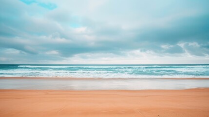 Wall Mural - Copy space on a deserted beach with the ocean in the background