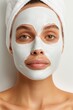 © piai - Portrait Photography of a Woman Using a Cosmetic Face Mask: Skincare and Beauty Routine