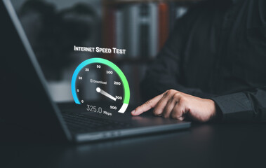 fast internet network connection speed test. man using a laptop computer to check bandwidth of wirel