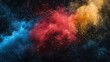© Yi - Vibrant Red, Blue, and Yellow Powder Explosion on Black Background. Abstract Colorful Dust Splash in Space with Bright Exploding Particles. Digital Art Texture of Color Chalk Paint Splatter.
