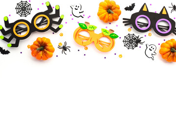 Wall Mural - Halloween frame made of pumpkins, ghost figures, and playful masks. Perfect for holiday themes and party invites. Vibrant and spooky elements for a fun celebration.