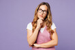 © ViDi Studio - Young minded successful employee business woman corporate lawyer wears white t-shirt vest glasses put hand prop up on chin, lost in thought and conjectures isolated on plain light purple background.
