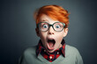 © Nadezda Ledyaeva - Surprised red-haired boy with open mouth looks up white t-shirt cropped view