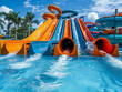 © pavlofox - Colorful Water Slides At A Water Park On A Sunny Day