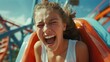 © Alexander Chaykin - Young girl enjoying thrill ride on a roller coaster