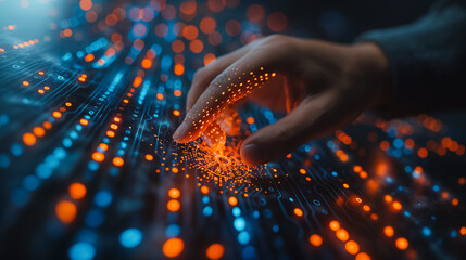Wall Mural - a hand is touching a screen with a blue and orange background. concept of technology and innovation,