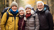 © halo - senior people group hiking in the forest in autumn, portrait looking at camera, photography.