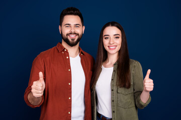 Wall Mural - Photo of attractive lovely couple wife husband wear stylish clothes thumb up sale discount isolated on dark blue color background