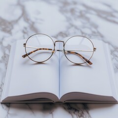Aufkleber - A pair of round eyeglasses rests on an open book, the pages are blank and the background is a minimalist marble surface. Generative AI