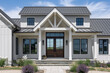 © Joseph Hendrickson - A grey modern farmhouse detail with a white wooden front door, black light fixtures and windows, and a covered porch.