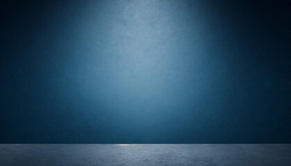 Poster - Empty Blue Studio Room with Concrete Floor, Textured Blue Wall, and Spotlight Creating Dramatic Lighting Effect, Suitable for Backgrounds, Presentations, and Design Layouts