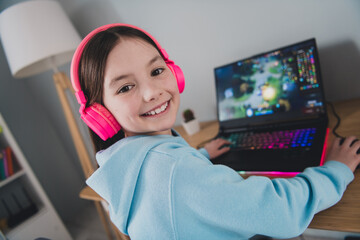 Canvas Print - Top view photo of cheerful positive adorable girl little gamer playing video computer game indoors house