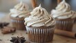 © Imtisal - Single spiced chai latte cupcake with chai-spiced frosting and cinnamon stick