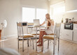 © StarDweller/peopleimages.com - Coffee, woman and laptop in kitchen for social media, networking and online app for morning. Technology, female person and relax in home for communication, internet and blog or website for connection