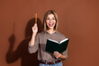 © deagreez - Photo of lovely glad smart woman wear plaid stylish clothes hand hold book isolated on brown color background