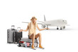 © Ljupco Smokovski - Female tourist sitting on a suitcase and waiting for a delayed flight