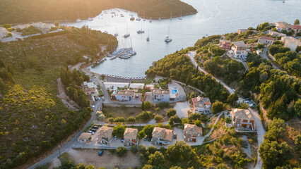 Poster - Aerial view of expensive residential houses in island small town Syvota Greece. American dream homes as example of real estate development in US suburbs