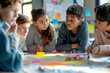 © Sunday Cat Studio - A diverse group of children collaborating on a school project, discussing and brainstorming ideas in a bright and engaging classroom.