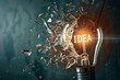 © Fabio - Creative idea light bulb with Idea explodes with shards of glass on a dark background. Business, ideas and new thinking. Think Different. Go beyond what is possible. Marketing. Creative thinking with