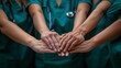 © kodidesign - Medical Team Joining Hands, Symbolizing Unity and Support, Ideal for Healthcare and Teamwork Themes