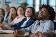 © Serhii - Asleep Meeting. Bored Colleagues at Diverse Company Workshop Struggling to Pay Attention