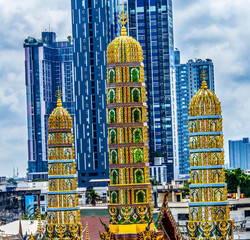 Wall Mural - Golden Three Towers Waramartaya Punthasatharam Temple Bangkok Thailand