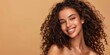 © Cyber Spektrum - Natural beautiful woman portrait with healthy face skin. Open smiling beautiful brunette woman with curly hair. Beauty, cosmetics skincare, dental care advertising concept, with Copy Space