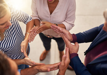 Poster - Circle, hands and huddle with team of business people in office from above for solidarity or unity. Arms, collaboration and support with employee group in workplace for synergy, trust or workflow