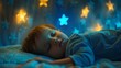 © Marco - beautiful baby sleeping in his bed with golden stars for night decoration