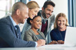 © Hira/peopleimages.com - Business people, smile and collaboration with laptop in office, diversity and together for problem solving. Task force, corporate team and online for risk assessment and stakeholder communication.