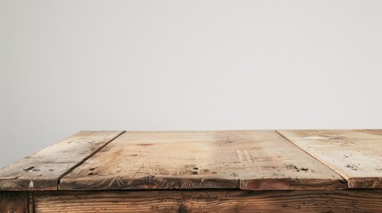 Wall Mural - Wooden table on white backdrop for advertising idea