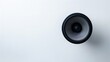 © Shozib - Sleek black audio speaker emits vibrant sound waves on a clean white background, symbolizing cutting-edge technology and entertainment