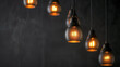 © Karimah - Modern decorative electric lamps on ceiling in dark room with space for background.