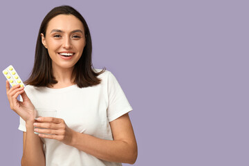 Sticker - Pretty young woman with pills on lilac background