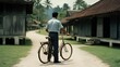© Kepuklala - man, bicycle, south east asia, malaysia village