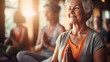 © halo - group of senior women practicing fitness in yoga studio, retired female group exercising, sport for elderly people