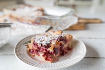 Wall Mural - Piece of delicious sweet casserole with cherries. Delicious german summer dessert called Kirschen Michel