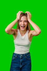 Sticker - Young Woman Reacts With Joy and Surprise Against a Green Screen