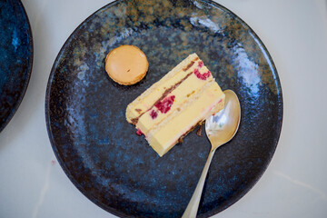 the cake on a plate placed on a table