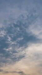 Wall Mural - Twilight and dawn sky with cumulus cloud vertical time lapse in an evening.