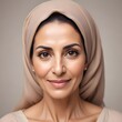© Aaron - A 50 year old Middle Eastern lady with an illuminated healthy complexion, showcasing smooth skin and a calm expression, reflecting the effects of a recent beauty treatment
