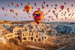 © Artur - Cappadocia, inspiring beautiful landscape with hot air balloons and old cave city in Turkey
